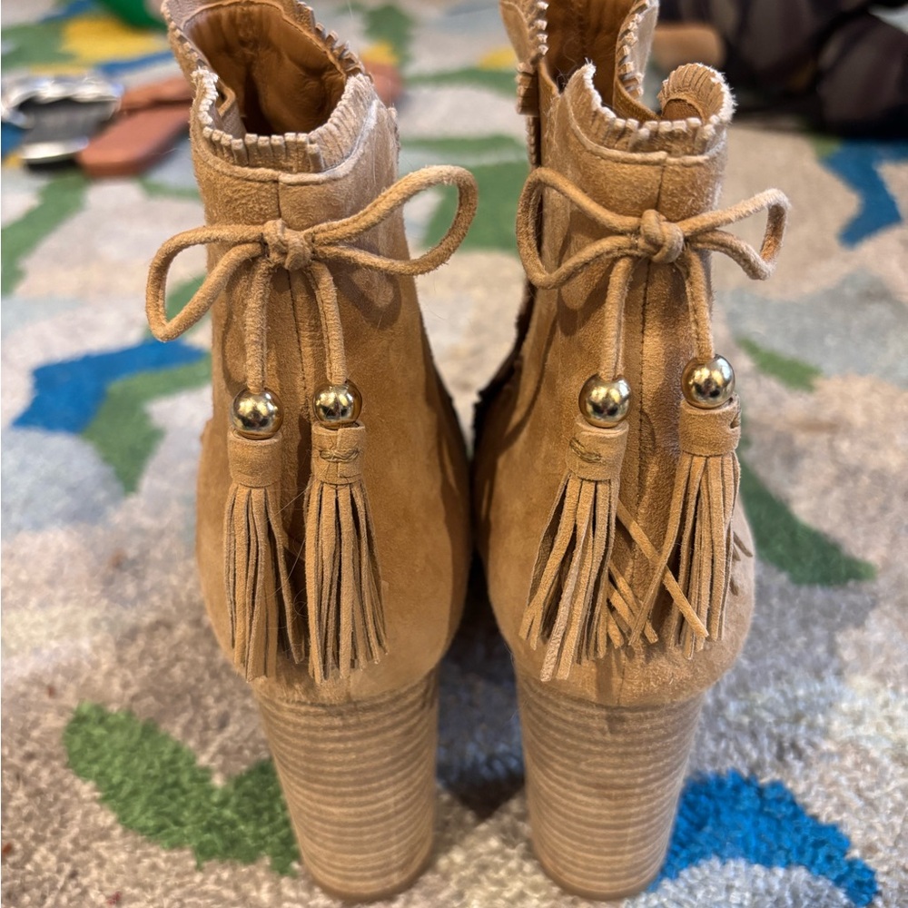 Aquazzura Tristan Suede Ankle Bootie in brown size 37.5 w tassel detailing.